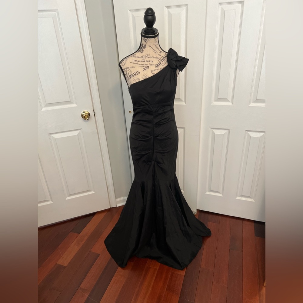 Black mermaid shaped formal dress.